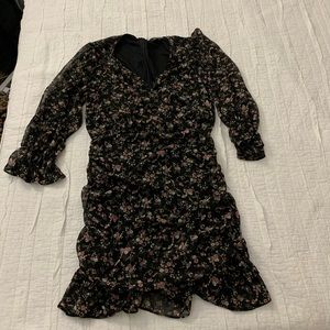 Black flowery wrap dress-sequel around the bust. Extremely flattering!